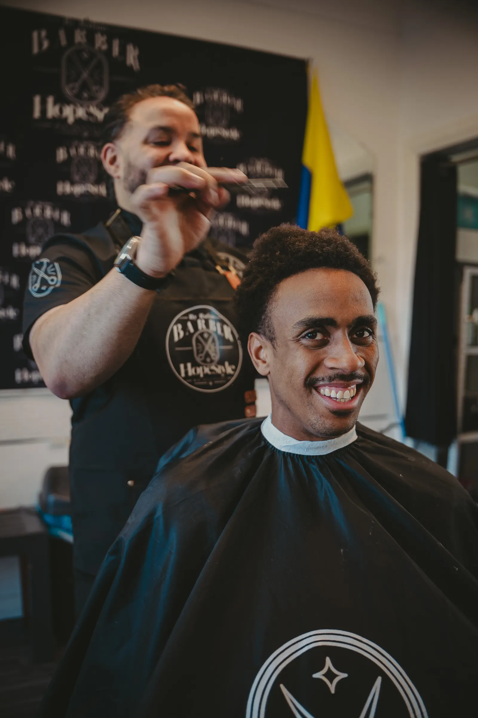 Rufino with a smiling client